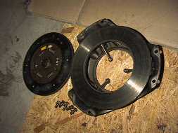 clutch and pressure plate laying on ground